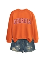 Detail of Georgia print on orange crewneck sweatshirt paired with frayed denim shorts - S / Orange