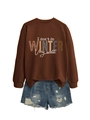 Detail of a brown crewneck sweatshirt with 'I don't do winter very well' graphic print - Coffee (White Print)
