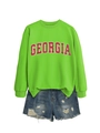 Detail of green Georgia sweatshirt paired with distressed blue denim shorts - Fluorescent Green