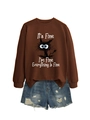 Close-up of brown sweatshirt with black cat graphic and 'It's Fine' slogan details - Coffee (White Print)