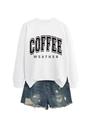 Detailed flat lay of white long sleeve sweatshirt and distressed denim shorts outfit - White Sweatshirt (Black Text)