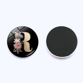 Floral crystal glass fridge magnet featuring golden letter R on black background - Letter R