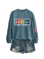 Detail of teal sweatshirt with PARAS print and distressed denim shorts set for women - Blue (White Graphic)