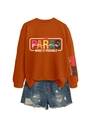 Close-up of rust orange sweatshirt with PARAS print and distressed denim shorts set - Rust Orange (White Graphic)
