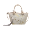 Elegant bucket bag with bamboo print, knotted handle, and long tassel pendant - White