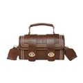 Brown barrel shoulder bag with wide printed strap and decorative white stitching detail - Brown