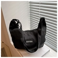 Dettaglio borsa hobo in tela nera con patch FANYISSA e portamonete rotondo staccabile - Stile Borsa nella Borsa / Nero