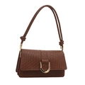 Brown woven leather shoulder bag with gold horseshoe buckle and knotted strap detail - Tan