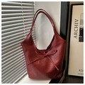 Detail of red woven tote bag with slim leather bow and dense texture craftsmanship - Red