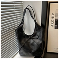 Detail of black woven texture shoulder bag with decorative bow and large capacity design - Black