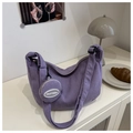 Detail of light purple corduroy hobo bag with matching mini round pouch and strap - Purple