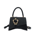 Borsa a mano nera glitterata con base curva e fibbia a fiore in metallo dorato - Nero