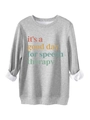Détail de l'imprimé texte et de la doublure en polaire douce du sweat gris - S / Gris clair