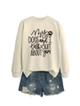 Detail of white crewneck sweatshirt with dog quote and distressed denim shorts - Sand (Black Font)
