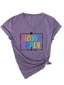 Detail of V-neck purple t-shirt featuring SECOND GRADE vibes print and a knotted hem - S / Purple (Black Print)