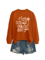 Close-up of orange sweatshirt slogan My Dogs And I Talk Shit and denim shorts detail - Burnt Orange (White Font)