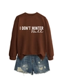 Close-up of I Don't Winter Well slogan print on brown pullover and ripped denim shorts - S / Tops / Coffee (White Font)