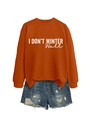 Flat lay of an orange sweatshirt with I DON'T WINTER WELL text and distressed denim shorts - S / Tops / Burnt Orange (White Print)