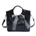 Minimalist black oil wax leather handbag with white lace bow and gold hooks - Black