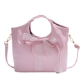 Pink patent leather bucket bag with large white lace bow and glossy finish design - Pink
