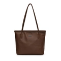 Minimalist dark brown lychee texture tote bag with metallic logo on white background - Brown