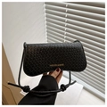 Black woven leather crossbody bag with gold lettering and slim shoulder strap - Black
