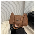 Chic brown crocodile embossed underarm bag with a silver star buckle detail - Tan
