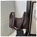 Close-up of matte dark brown tote bag featuring textured fabric and woven rope pendant detail - Coffee With Pendant