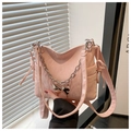 Detail of light pink faux leather bag with silver butterfly clasp and metal chain link - Pink