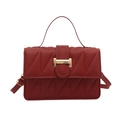 Deep red quilted crossbody bag with golden buckle and adjustable strap for women - Red