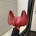 Dark red crescent hobo bag with woven texture and golden M-letter pendant charm - Red