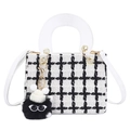 Elegant black and white tweed handbag with white leather handles and a playful monster charm - White With Pendant