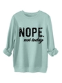 Detail of mint green sweatshirt featuring NOPE NOT TODAY print and ribbed crewneck collar - Light Green