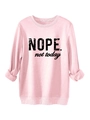 Detail of pink fleece sweatshirt featuring black NOPE not today artistic textured print - Pink