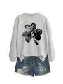 Close-up of a grey crewneck sweatshirt featuring a vintage black clover graphic design - S / Gray (Black Shamrock Print)