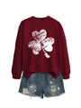 Close-up of burgundy crewneck sweatshirt with white clover print and ripped denim shorts - S / Wine Red (White Shamrock Print)