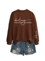 Détail de l'imprimé sur la manche NOT THE WHOLE story sur sweat-shirt marron café - Café (Police Blanche)