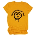 Detail of mustard yellow cotton T-shirt featuring a black smiley face and text print - S / Mustard Yellow (Black Text)