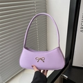 Lavender purple baguette underarm bag with golden metallic bow and slim handle strap - Purple
