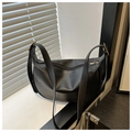 Minimalist black crescent shoulder bag with adjustable strap and matte finish - Black