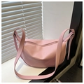 Minimalist soft pink crescent crossbody bag with adjustable strap in smooth faux leather - Pink