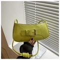 Close-up of vibrant lime green PU leather shoulder bag featuring a large metal buckle - Green