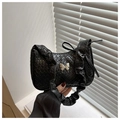 Black woven shoulder bag with silver butterfly charm and scrunchie strap detail - Black