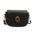 Minimalist matte black saddle bag with a prominent golden arched buckle and crossbody strap - Black