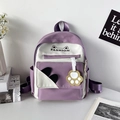 Mochila escolar morada y blanca con orejas de gato y colgante de garra amarilla - Morado