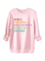 Detailed view of pink casual sweatshirt featuring colorful slogan print and ribbed cuffs - S / Pink