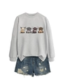 Flat lay of grey crewneck sweatshirt with highland cattle print and ripped denim shorts - S / Gray