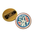 Vintage Statue of Liberty and US flag themed round brooch with bronze back finish - Silhouette Flag Style / Bronze