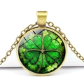 Vintage bronze necklace with green glass four-leaf clover pendant on white background - Bronze Base Forest Four Leaf Clover White Background (Bronze 7)
