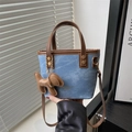 Blue denim mini handbag with brown leather trim and a cute dog charm on handle - With Pendant / Blue
